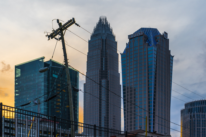 Charlotte skyscrapers and a powerline pole from first ward park