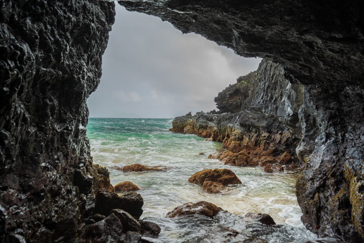 View from inside an island cave and the ocean beyond